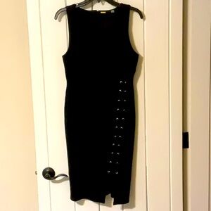 T Tahari sleeveless black fitted dress with lace up detail, size 4.